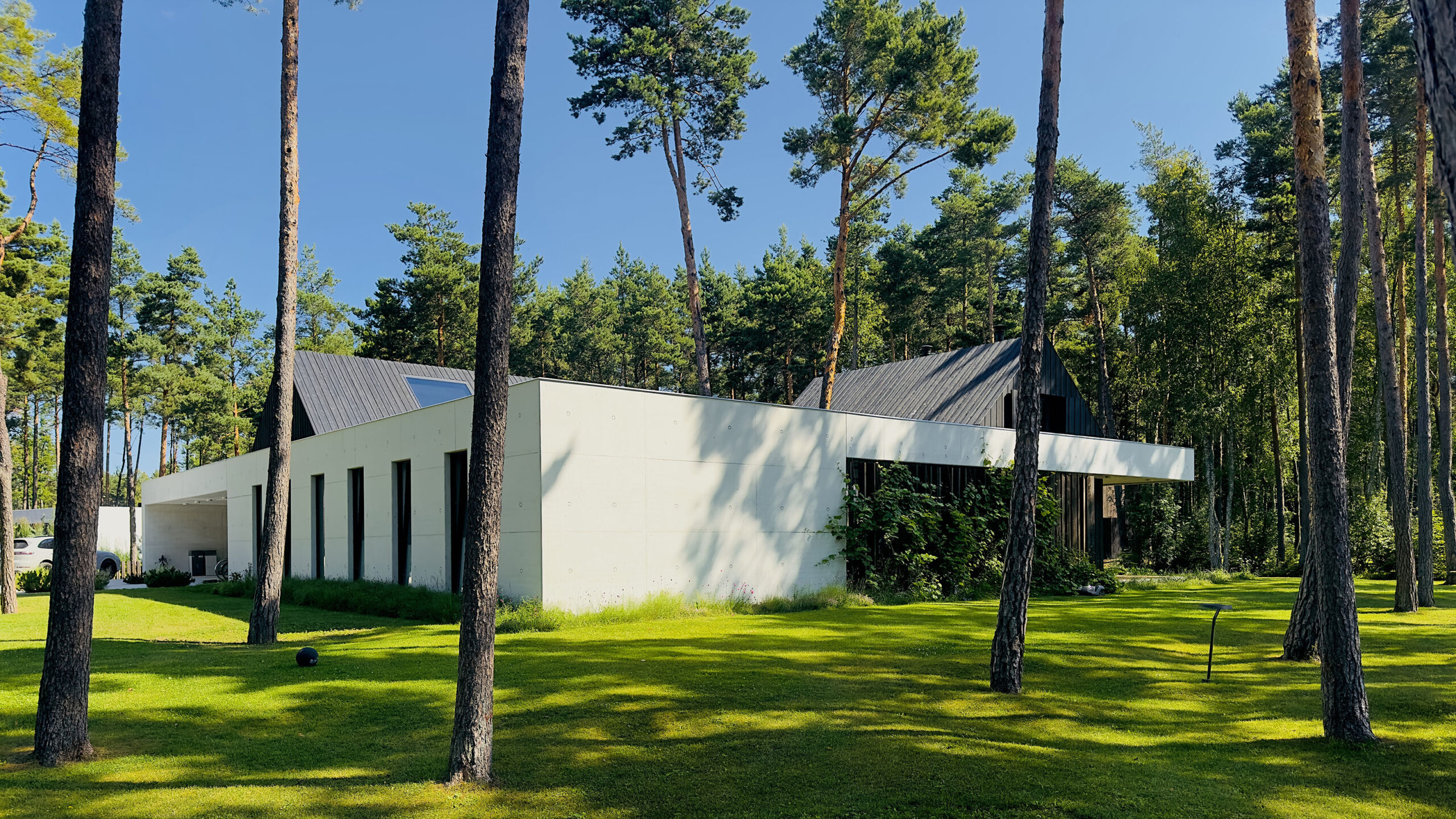 A064_house_estonia_tallinn_viimsi_concrete_villa_forest_wood_-1