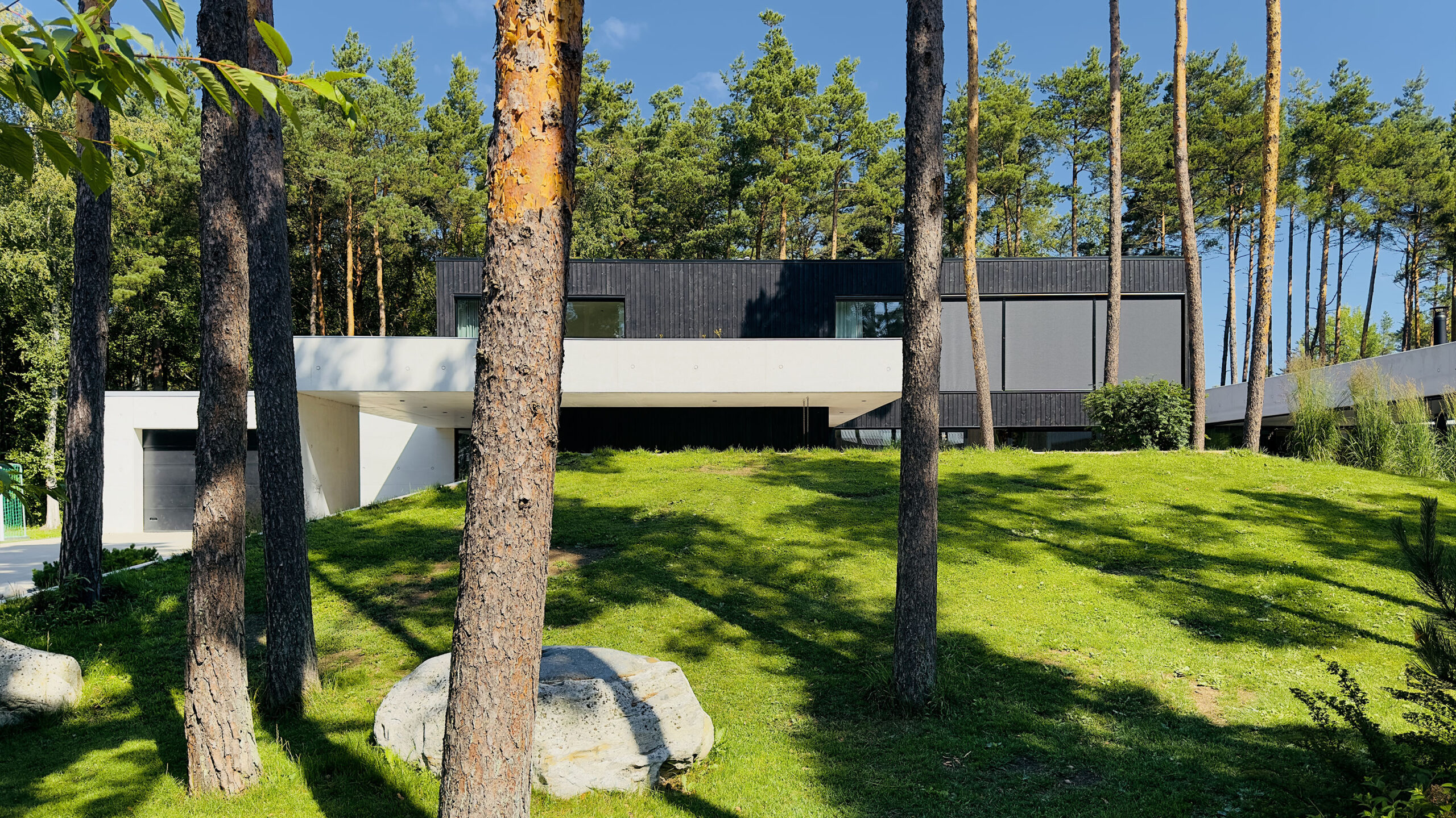 A064_house_estonia_tallinn_viimsi_concrete_villa_forest_wood_-4